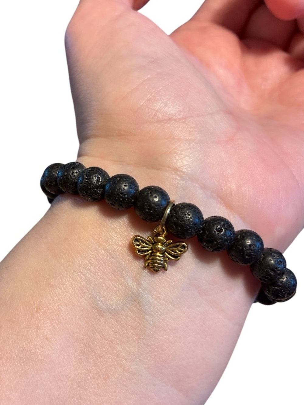 Black Lava Stone Bead Stretch Bracelet With Gold Bee Charm